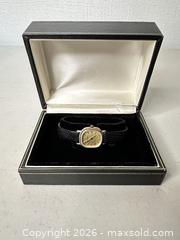 MaxSold Auction: Bulova Women's Quartz Wristwatch with Black Leather Strap - San Jose (California, USA) SELLER MANAGED Downsizing Online Auction - East Humboldt Street