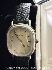 MaxSold Auction: Bulova Women's Quartz Wristwatch with Black Leather Strap - San Jose (California, USA) SELLER MANAGED Downsizing Online Auction - East Humboldt Street