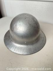 MaxSold Auction: M1 Pot Style Military Helmet, Silver Unpainted Metal - San Jose (California, USA) SELLER MANAGED Downsizing Online Auction - East Humboldt Street