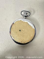 MaxSold Auction: Security Swiss Pocket Stopwatch, Chrome-Plated Silver Case - San Jose (California, USA) SELLER MANAGED Downsizing Online Auction - East Humboldt Street