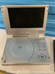 MaxSold Auction: Portable DVD Player, Kobo eReader & Scientific Calculator - Vancouver (British Columbia, Canada) SELLER MANAGED Reseller Online Auction - East 7th Avenue (STORAGE)
