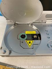 MaxSold Auction: Portable DVD Player, Kobo eReader & Scientific Calculator - Vancouver (British Columbia, Canada) SELLER MANAGED Reseller Online Auction - East 7th Avenue (STORAGE)