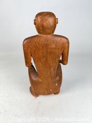 MaxSold Auction: Hand carved wooden figure, crouching man, mother of pearl eyes - Concord (California, USA) SELLER MANAGED Estate Sale Online Auction - Landana Drive