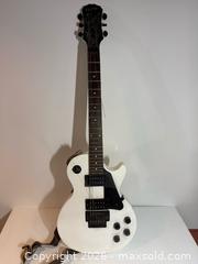 MaxSold Auction: Epiphone Les Paul Studio Electric Guitar - San Jose (California, USA) SELLER MANAGED Estate Sale Online Auction - South 16th Street