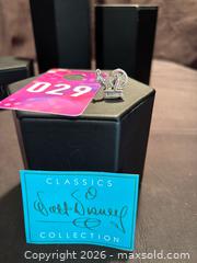 MaxSold Auction: Disney WDCC Sleeping Beauty Touch the Spindle Sterling Silver Moving Charm 1999 - Aurora (Ontario, Canada) SELLER MANAGED Estate Sale Online Auction -  Closs Square