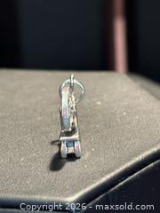 MaxSold Auction: Disney WDCC Sleeping Beauty Touch the Spindle Sterling Silver Moving Charm 1999 - Aurora (Ontario, Canada) SELLER MANAGED Estate Sale Online Auction -  Closs Square