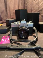 MaxSold Auction: Minolta SRT200 35mm Film Camera w/ MD Rokkor 45mm , 1:2 lens - Aurora (Ontario, Canada) SELLER MANAGED Estate Sale Online Auction -  Closs Square