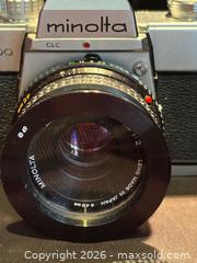 MaxSold Auction: Minolta SRT200 35mm Film Camera w/ MD Rokkor 45mm , 1:2 lens - Aurora (Ontario, Canada) SELLER MANAGED Estate Sale Online Auction -  Closs Square