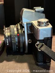 MaxSold Auction: Minolta SRT200 35mm Film Camera w/ MD Rokkor 45mm , 1:2 lens - Aurora (Ontario, Canada) SELLER MANAGED Estate Sale Online Auction -  Closs Square