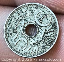 MaxSold Auction: 1924 Coin Holed world Coin  - Kingston (Ontario, Canada) SELLER MANAGED Downsizing Online Auction - Railway