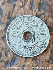 MaxSold Auction: 1924 Coin Holed world Coin  - Kingston (Ontario, Canada) SELLER MANAGED Downsizing Online Auction - Railway