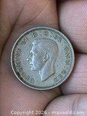 MaxSold Auction: 1951 One shilling Coin of England - Kingston (Ontario, Canada) SELLER MANAGED Downsizing Online Auction - Railway