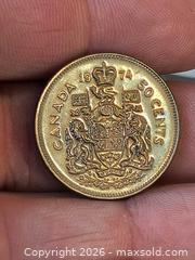 MaxSold Auction: 1974 Canada 50 Cents Coin  - Kingston (Ontario, Canada) SELLER MANAGED Downsizing Online Auction - Railway