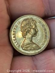 MaxSold Auction: 1974 Canada 50 Cents Coin  - Kingston (Ontario, Canada) SELLER MANAGED Downsizing Online Auction - Railway