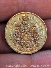 MaxSold Auction: 1979 Canada 50 Cent Coin - Kingston (Ontario, Canada) SELLER MANAGED Downsizing Online Auction - Railway