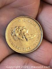 MaxSold Auction: 1999 Milenium 25 Cent Canada mint - Kingston (Ontario, Canada) SELLER MANAGED Downsizing Online Auction - Railway