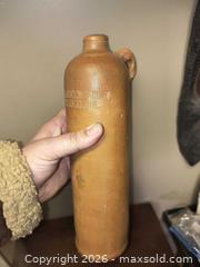 MaxSold Auction: Antique Crock Bottle for Bolts liquor Amsterdam  - Kingston (Ontario, Canada) SELLER MANAGED Downsizing Online Auction - Railway