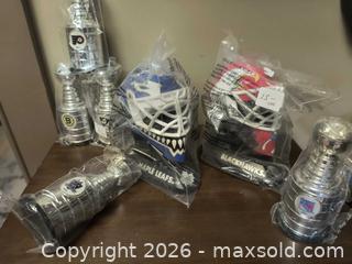 MaxSold Auction: Hockey Collection Mask and Stanley Cups  - Kingston (Ontario, Canada) SELLER MANAGED Downsizing Online Auction - Railway