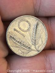 MaxSold Auction: Italian Wheat Plough Farm Coin Aluminum - Kingston (Ontario, Canada) SELLER MANAGED Downsizing Online Auction - Railway