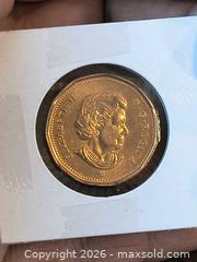 MaxSold Auction: Lucky Loonie Bronze Uncircualted Olympic Coin - Kingston (Ontario, Canada) SELLER MANAGED Downsizing Online Auction - Railway