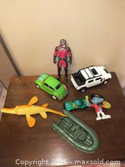 MaxSold Auction: toy collection lot cards boats Saw fish  - Kingston (Ontario, Canada) SELLER MANAGED Downsizing Online Auction - Railway