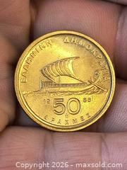 MaxSold Auction: UNC Greek Brass Coin 50 - Kingston (Ontario, Canada) SELLER MANAGED Downsizing Online Auction - Railway