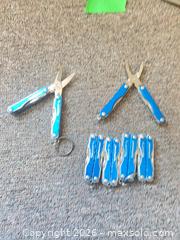 MaxSold Auction: Leatherman SQUIRT 5XP4 1XS4 Blue Keychain Multi-Tool Set of 6 - Hamilton (Ontario, Canada) SELLER MANAGED Estate Sale Online Auction - Concession Street