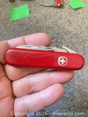 MaxSold Auction: Wenger Red Swiss Army Cutter golfer shackle - Hamilton (Ontario, Canada) SELLER MANAGED Estate Sale Online Auction - Concession Street