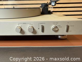 MaxSold Auction: Harman/Kardon T40 Auto-Lift Turntable w/ Ortofon VMS 20E MkII - Tested Working - Milton (Ontario, Canada) SELLER MANAGED Downsizing Online Auction - Broadway Avenue