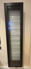 MaxSold Auction: IKEA Wall-Mounted Glass Display Cabinet - Slim Profile with 9 Shelves - Milton (Ontario, Canada) SELLER MANAGED Downsizing Online Auction - Broadway Avenue