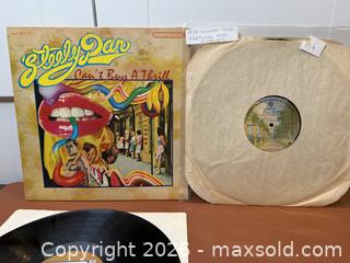 MaxSold Auction: Steely Dan "Can't Buy A Thrill" & Fleetwood Mac "Rumours" LP Duo - Ultrasonically Cleaned - Milton (Ontario, Canada) SELLER MANAGED Downsizing Online Auction - Broadway Avenue