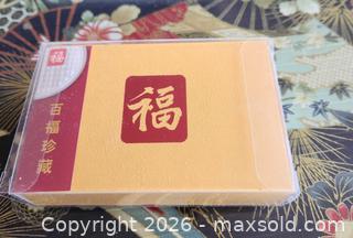 MaxSold Auction: Blessing coin and stamp collectible set - Vancouver (British Columbia, Canada) SELLER MANAGED Downsizing Online Auction - West 6th Avenue (CONDO)