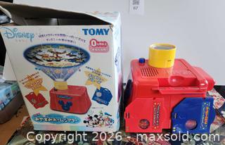 MaxSold Auction: Vintage Tomy Disney Baby musical Night Light Projector - Vancouver (British Columbia, Canada) SELLER MANAGED Downsizing Online Auction - West 6th Avenue (CONDO)