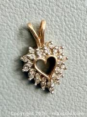 MaxSold Auction: 10K Yellow Gold Diamond Heart Pendant - Marked  - Toronto (Ontario, Canada) PARTNER MANAGED Reseller Online Auction - Queen Street West
