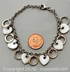 MaxSold Auction: 925 Silver Cut-out Heart & Circular Charm Bracelet - Marked  - Toronto (Ontario, Canada) PARTNER MANAGED Reseller Online Auction - Queen Street West