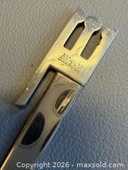 MaxSold Auction: MCM Alessi Sterling Silver Cocktail Stirrer - Marked  - Toronto (Ontario, Canada) PARTNER MANAGED Reseller Online Auction - Queen Street West