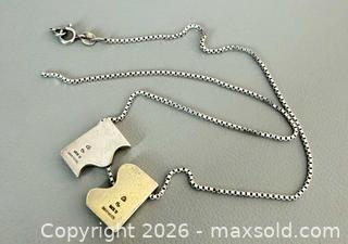 MaxSold Auction: Modernist Danish Anton Michelsen 925 Silver Puzzle Pendants with 925 Silver Italian Chain - Marked  - Toronto (Ontario, Canada) PARTNER MANAGED Reseller Online Auction - Queen Street West
