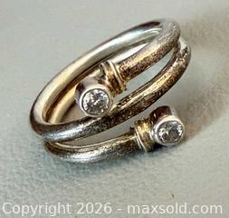 MaxSold Auction: PANDORA 925 Silver Earrings, 925 Silver Bypass Design Ring & 925 Silver Crystal Earrings - Marked  - Toronto (Ontario, Canada) PARTNER MANAGED Reseller Online Auction - Queen Street West
