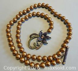 MaxSold Auction: Signed HEIDI DAUS Long Necklace  - Toronto (Ontario, Canada) PARTNER MANAGED Reseller Online Auction - Queen Street West