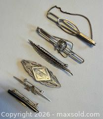 MaxSold Auction:  Vintage Stratton England Tie Clip & (5) More Vintage Tie Clips - Toronto (Ontario, Canada) PARTNER MANAGED Reseller Online Auction - Queen Street West