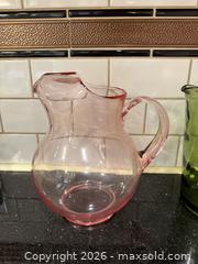 MaxSold Auction: Vintage Pink Depression Glass Pitcher with Ice Guard & Vintage/Retro Style Avocado Green Glass Drink Pitcher with Handle - San Jose (California, USA) SELLER MANAGED Estate Sale Online Auction - South 16th Street
