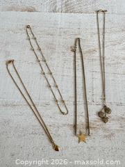 MaxSold Auction: Four Mixed Gold Tone Fashion Jewelry Necklaces - Locket, Star, Beads and Heart - Kingston (Ontario, Canada) SELLER MANAGED Downsizing Online Auction - Bishop Street