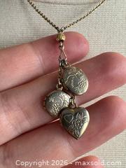 MaxSold Auction: Four Mixed Gold Tone Fashion Jewelry Necklaces - Locket, Star, Beads and Heart - Kingston (Ontario, Canada) SELLER MANAGED Downsizing Online Auction - Bishop Street