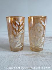 MaxSold Auction: Orange Carnival Lusterware Glasses with White Sunflower and Leaf Design  - Kingston (Ontario, Canada) SELLER MANAGED Downsizing Online Auction - Bishop Street
