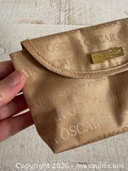 MaxSold Auction: Oscar De La Renta Perfume Mini Cosmetics Bag - Kingston (Ontario, Canada) SELLER MANAGED Downsizing Online Auction - Bishop Street