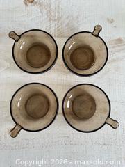 MaxSold Auction: Set of Four Smoky Glass Vintage Brown Lug Handle Glass Soup Bowls - Kingston (Ontario, Canada) SELLER MANAGED Downsizing Online Auction - Bishop Street