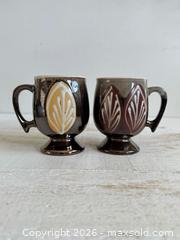 MaxSold Auction: Set of Two Vintage Pedestal Mugs with Brown Glaze and Leaf Design  - Kingston (Ontario, Canada) SELLER MANAGED Downsizing Online Auction - Bishop Street