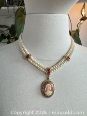 MaxSold Auction: Three Mixed Pearl Accent Fashion Necklaces with Decorative Clasps and Cameo  - Kingston (Ontario, Canada) SELLER MANAGED Downsizing Online Auction - Bishop Street