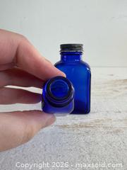 MaxSold Auction: Vintage Cobalt Blue Collectible Empty Vintage Bottles  - Kingston (Ontario, Canada) SELLER MANAGED Downsizing Online Auction - Bishop Street