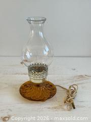 MaxSold Auction: Vintage Electric Hurricane Lamp with Amber Coloured Base and Clear Shade  - Kingston (Ontario, Canada) SELLER MANAGED Downsizing Online Auction - Bishop Street